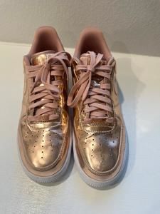 Woman’s 11 Nike Air Force Metallic Pink